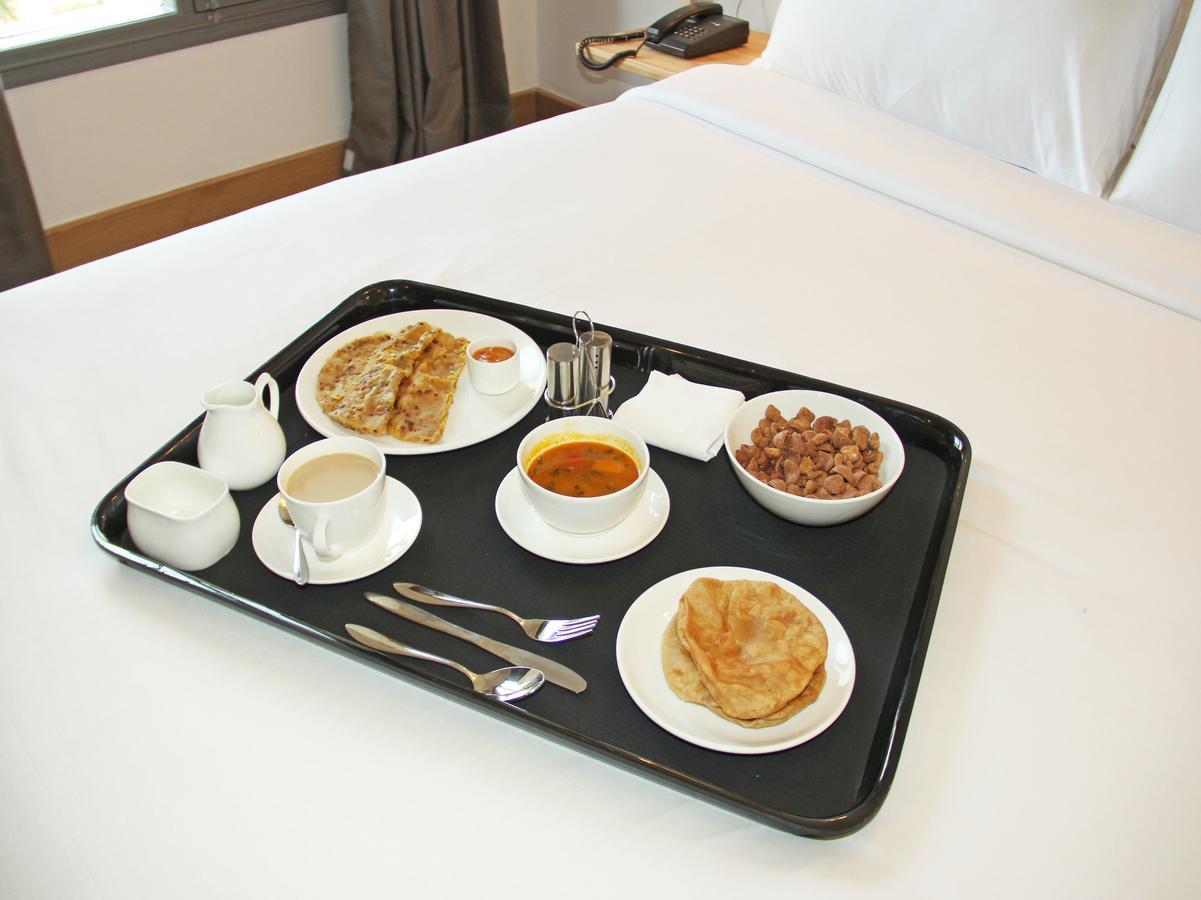 Sn Hotel Munnar Bagian luar foto